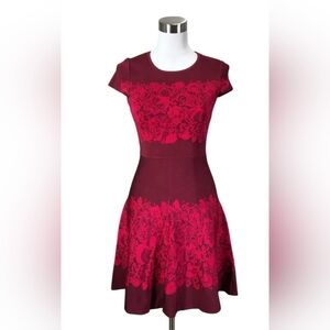 Dress by Karen Millen. Sz XS. Burgundy with red scroll floral designs.